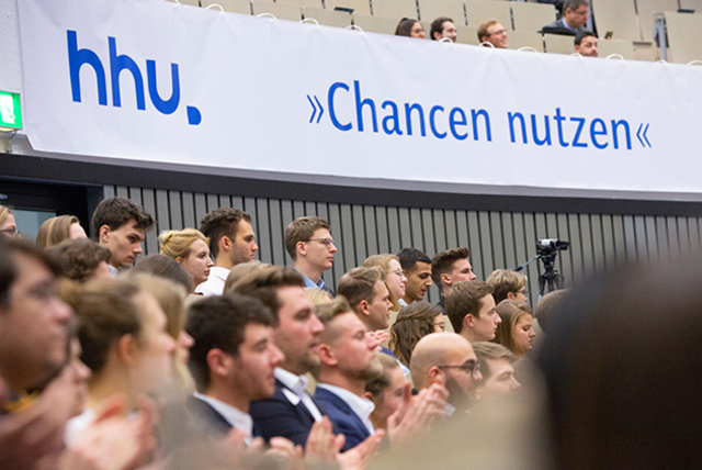  Students listening to the scholarship award ceremony